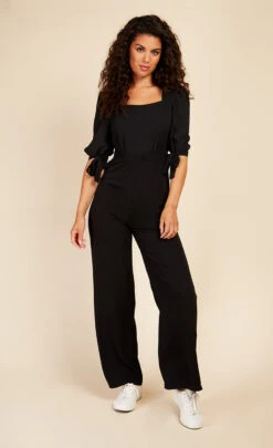 Little Mistress Black Seersucker Jumpsuit -Occasion Couture Shop D3361761A 1